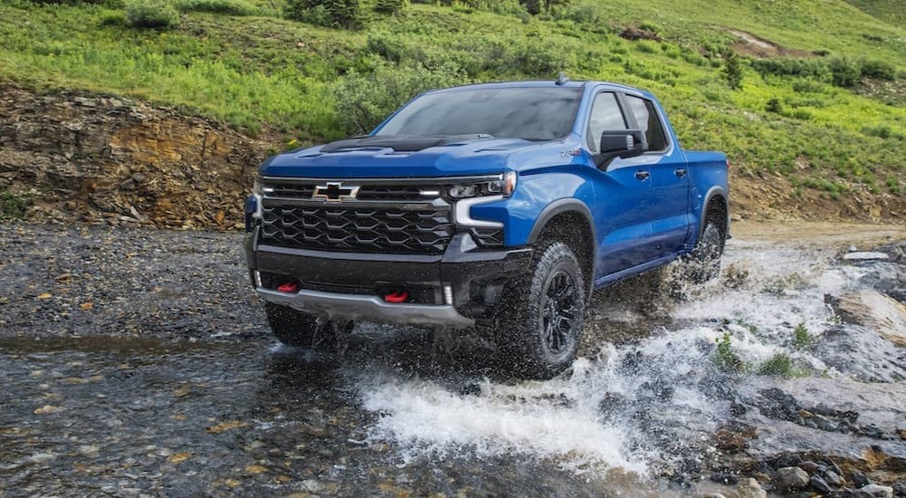 A blue 2022 Chevy Silverado 1500 ZR2 off-roading.