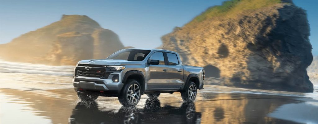 A silver 2024 Chevy Colorado Z71 driving on the water.