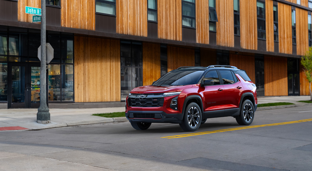 A red 2025 Chevy Equinox for sale near San Antonio from the side.