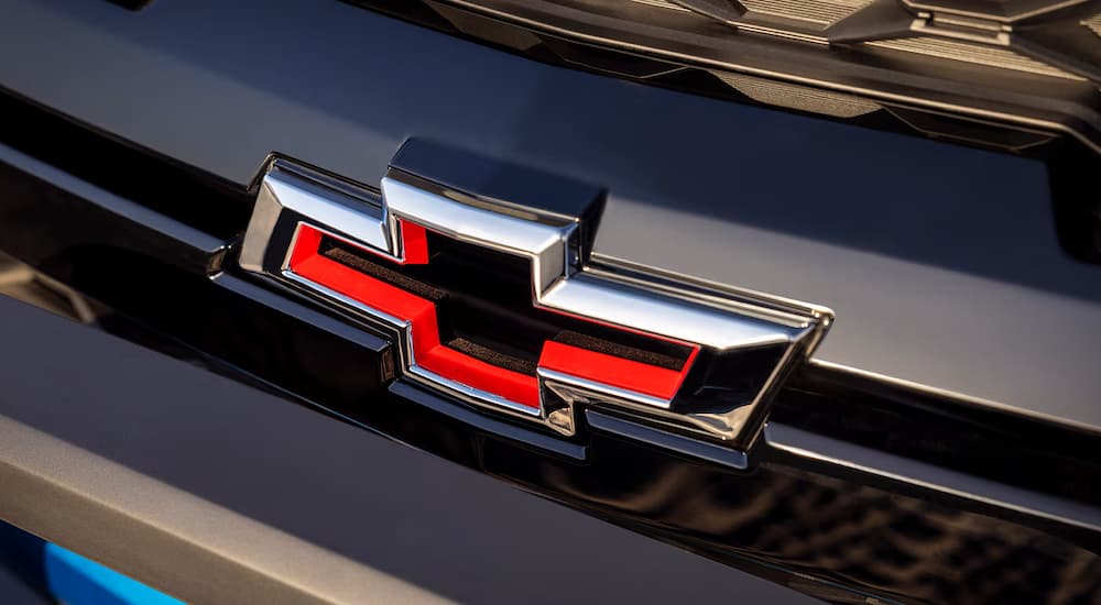 Close-up of the Chevy badge on a 2025 Chevy Colorado vs 2025 Ford Ranger