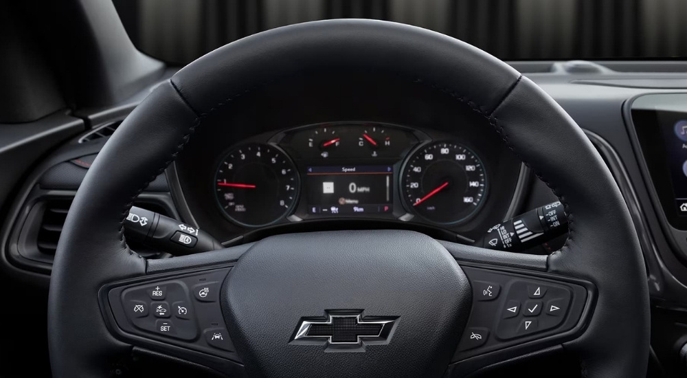 Instrument cluster and steering wheel in a 2023 Chevy Equinox.
