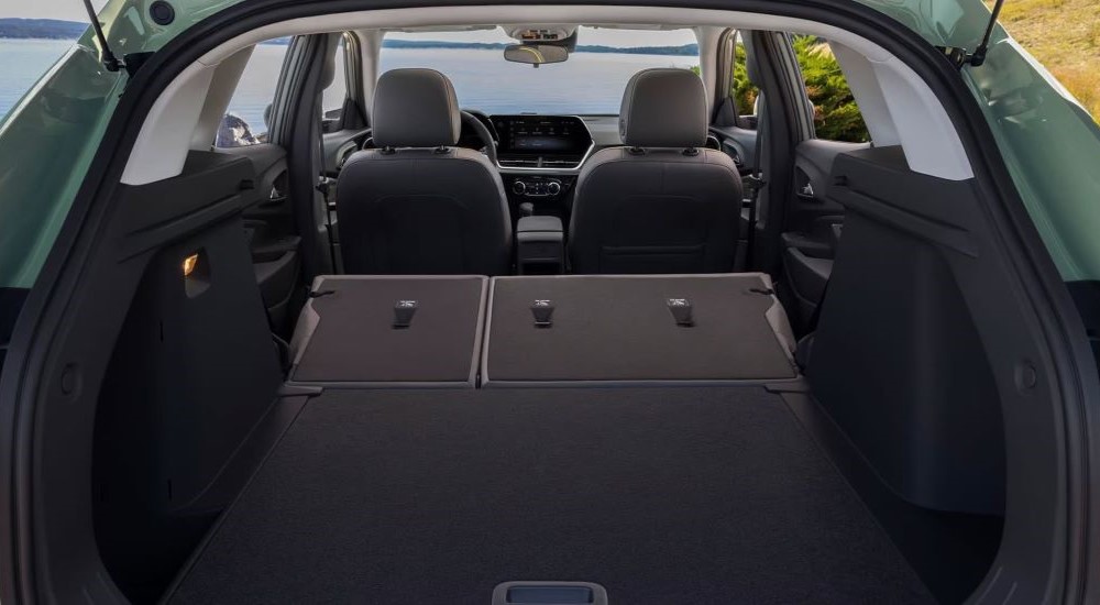 Rear folded seats in a green 2026 Chevy Trax for sale near San Antonio