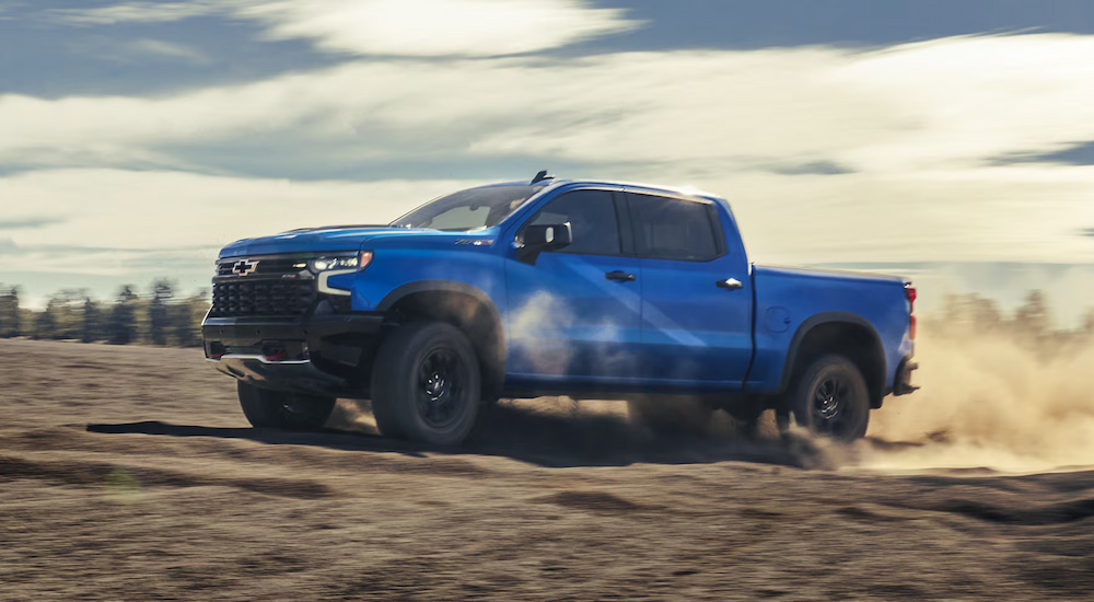 Blue 2026 Chevy Silverado ZR2 driving off-road.