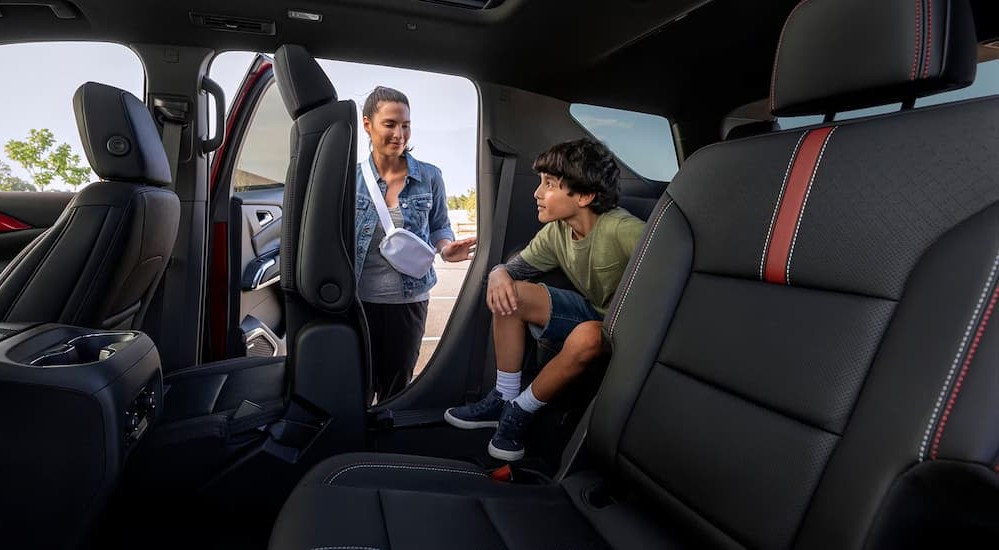 A child in the rear seat in a 2026 Chevy Traverse.