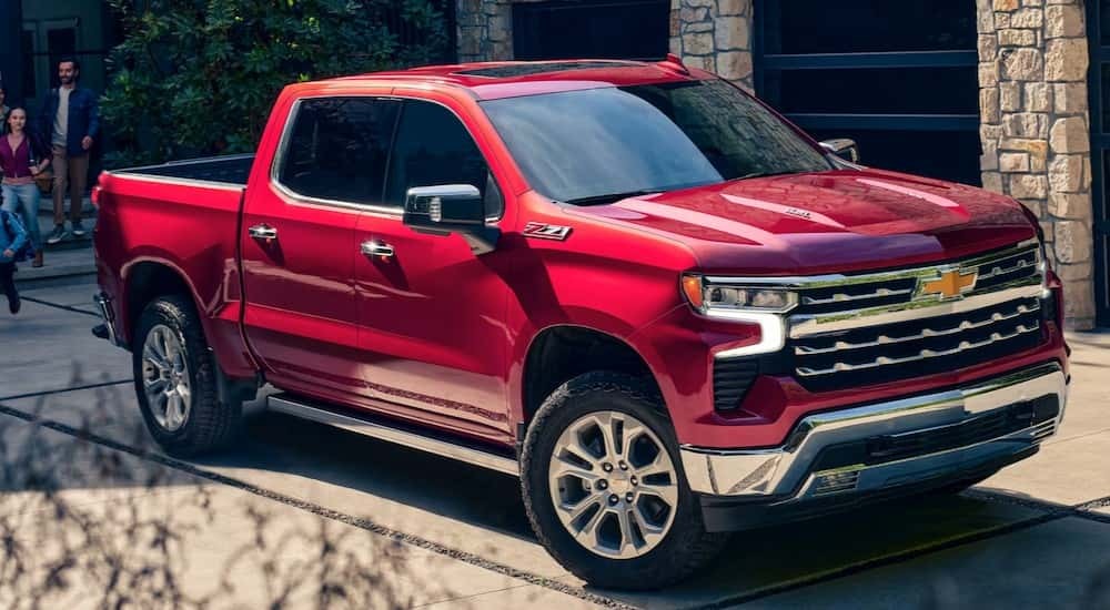 Red 2026 Chevy Silverado 1500 parked in a driveway