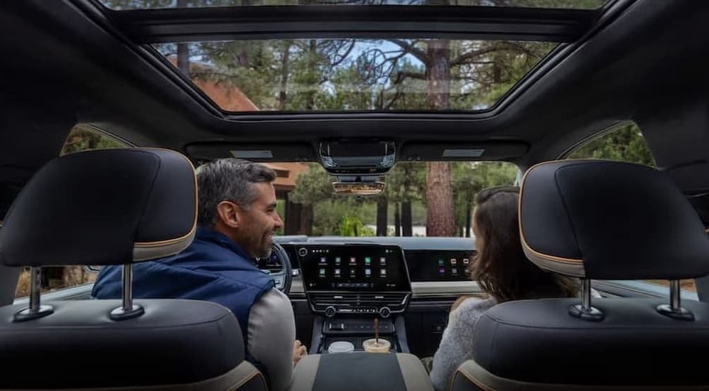 People in the black interior in a 2027 Chevy Silverado 1500.
