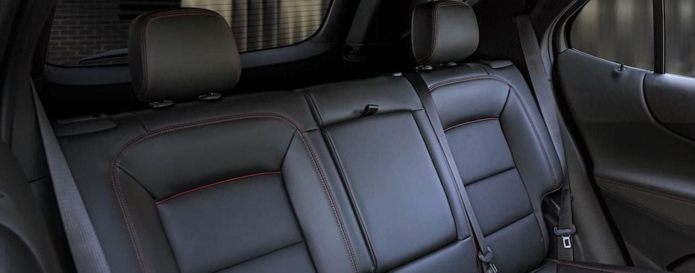 A close up of the rear black leather seats in a 2022 Chevy Equinox RS.