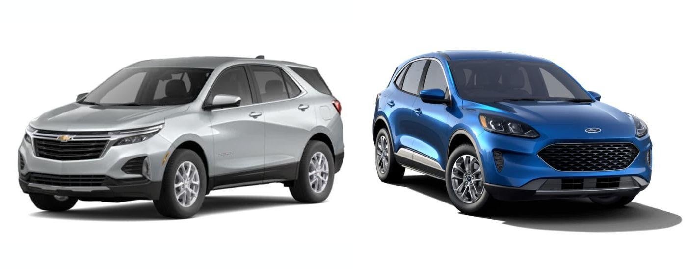 A silver 2022 Chevy Equinox is angled right next to a left angled blue 2022 Ford Escape.