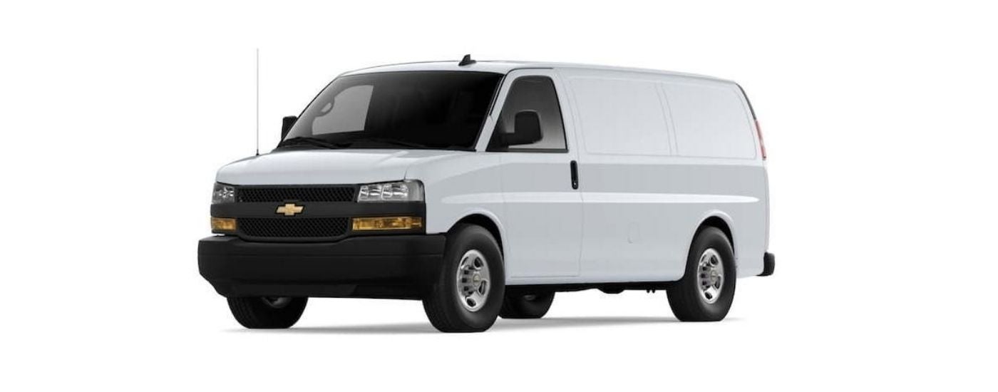 A white 2022 Chevy Express Van is angled left.