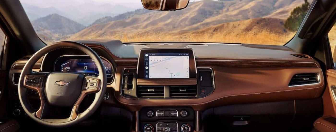 The brown interior of a 2022 Chevy Suburban.