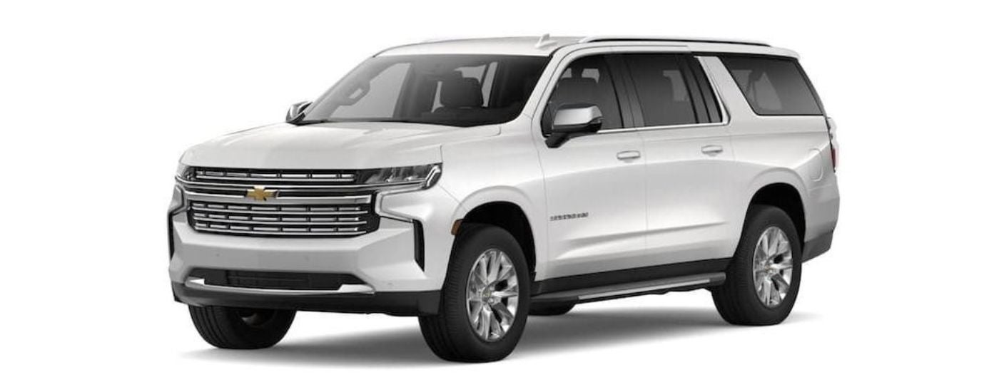 A white 2022 Chevy Suburban is angled left.