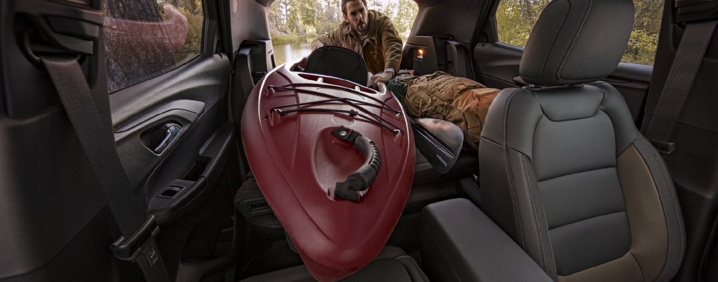 Red kayak in a 2022 Chevy Trailblazer.