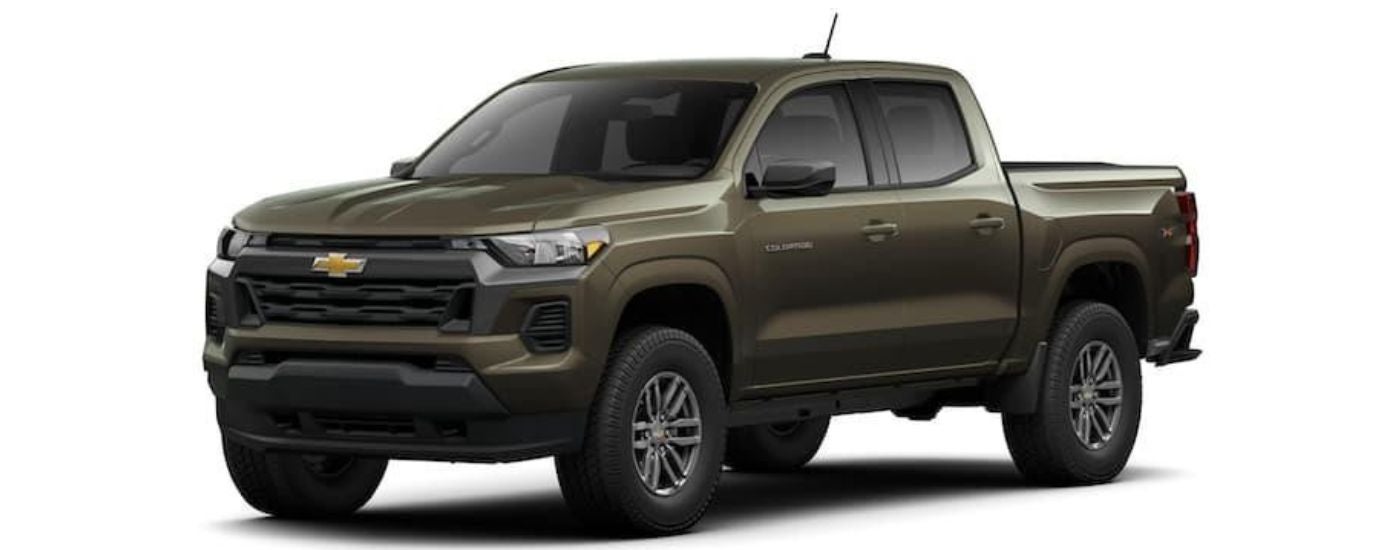 A green 2023 Chevy Colorado is angled left.
