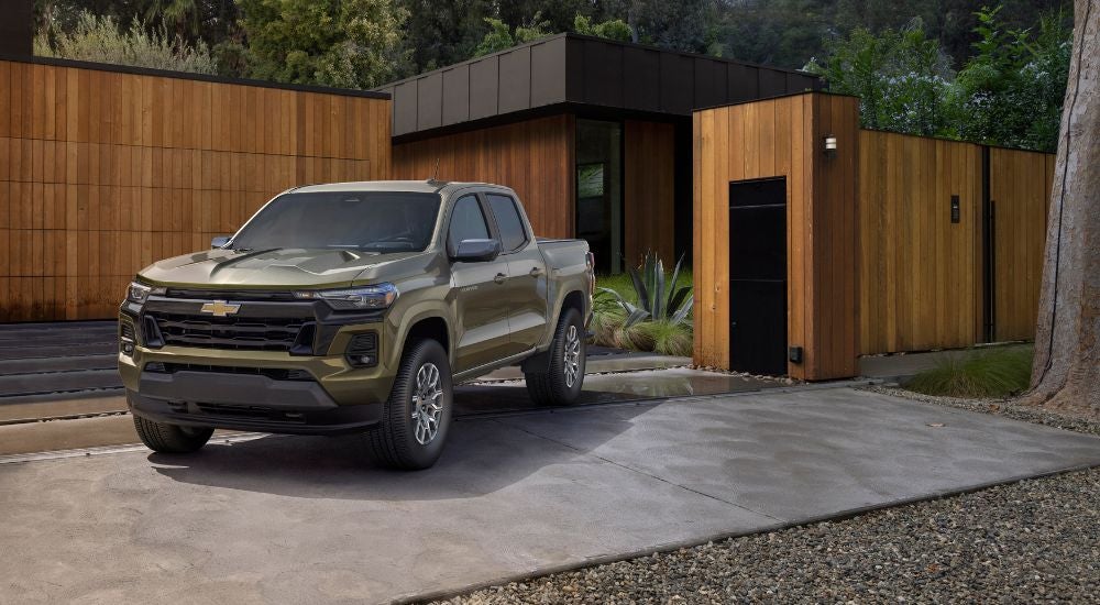 green 2025 Chevy Silverado 1500 parked on a driveway