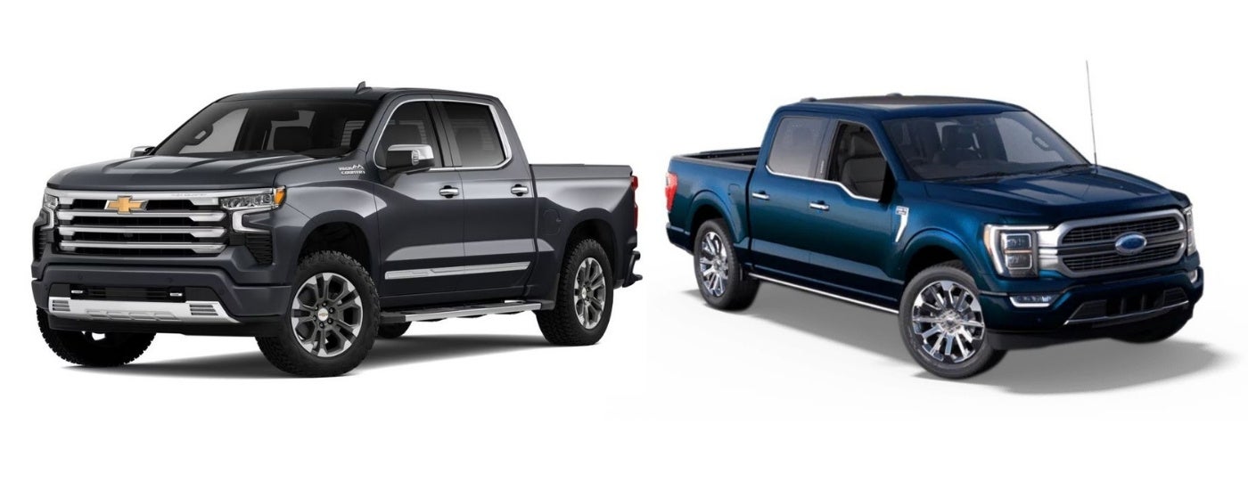 A grey 2023 Chevy Silverado 1500 and a black 2023 Ford F-150 XLT facing away from each other.