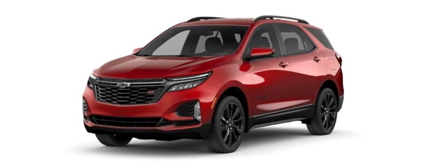 A red 2024 Chevy Equinox RS is shown angled left.