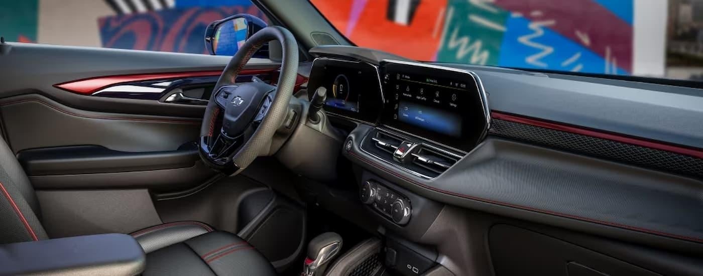 The interior of a 2024 Chevy Trailblazer shows the steering wheel and center console.