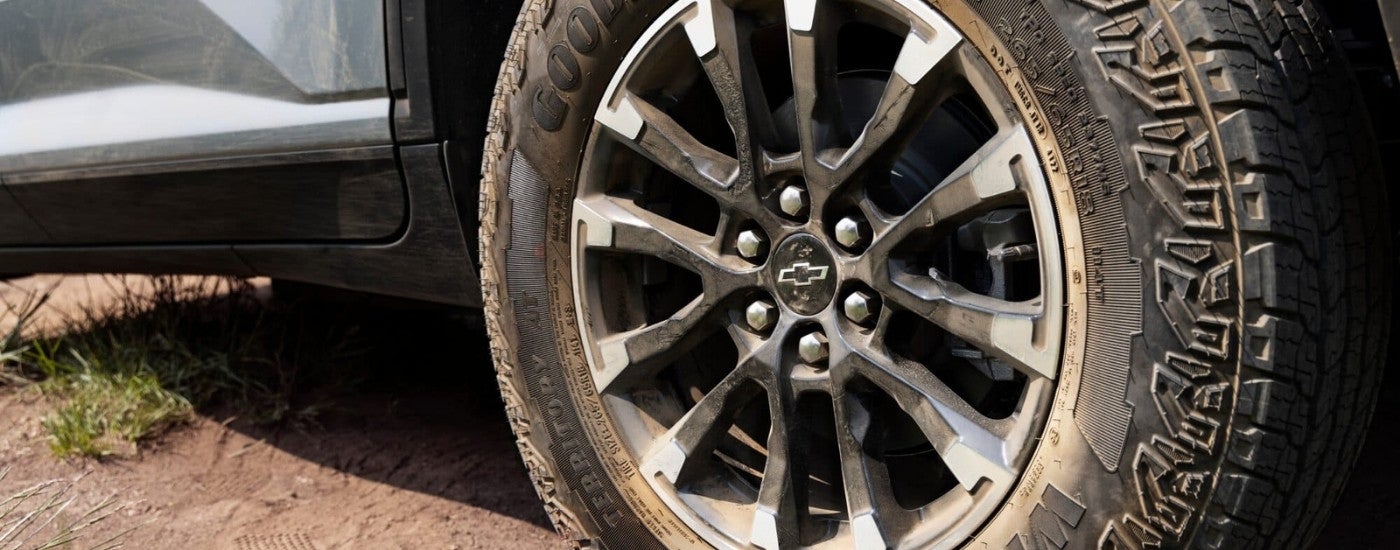 Front wheel of a silver 2026 Chevy Traverse