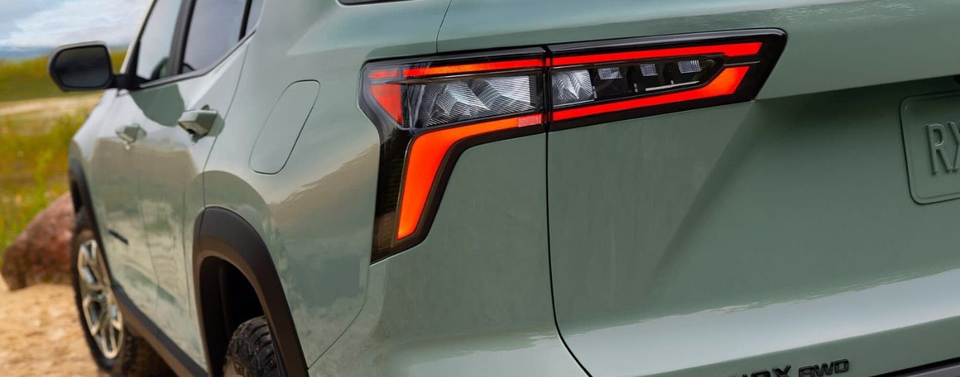 Driver side taillight on a green 2025 Chevy Equinox ACTIV.