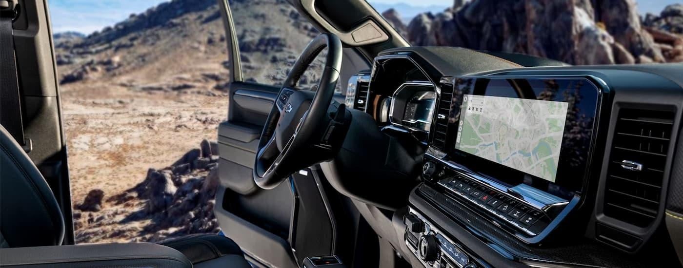A close up of the center console and dashboard in a 2025 Chevy Silverado 1500.