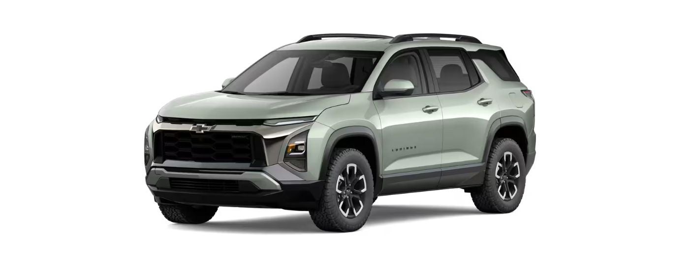 A green 2026 Chevy Equinox angled left.