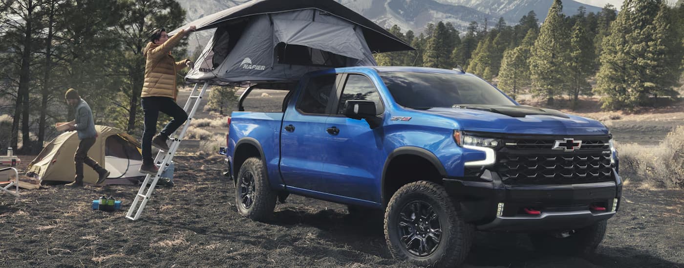 Blue 2026 Chevy Silverado 1500 ZR2 Bison parked at a remote campsite