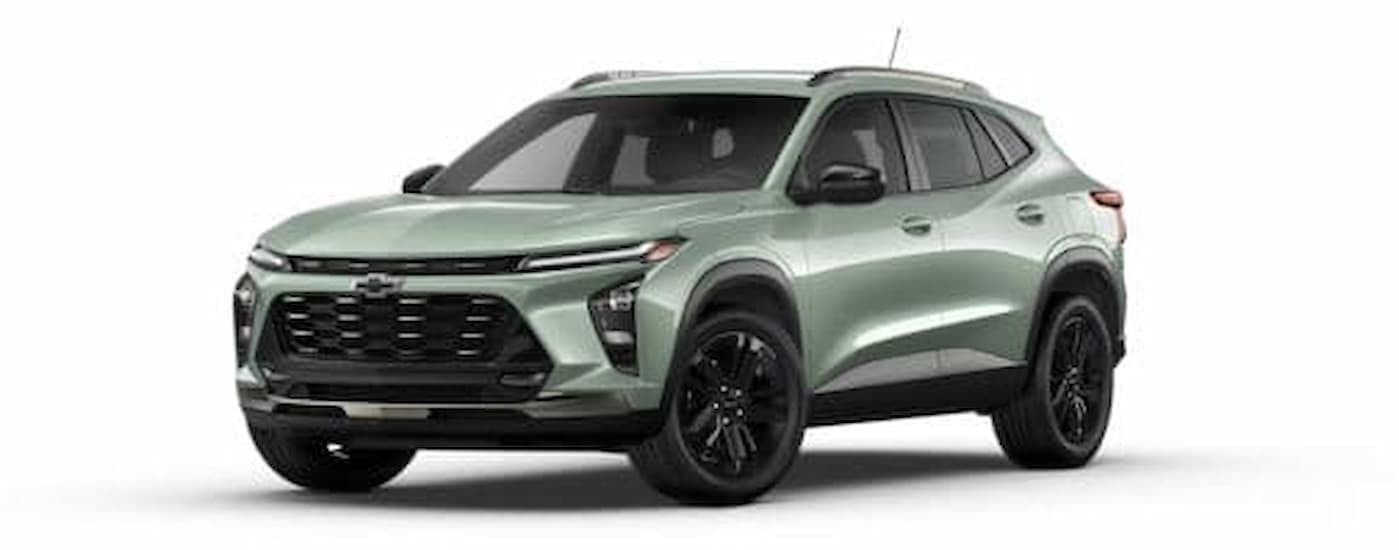 A green 2026 Chevy Trax ACTIV angled left.