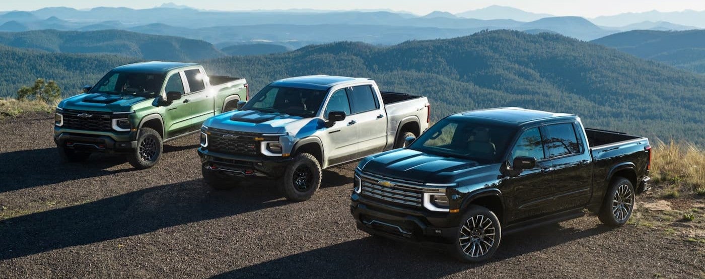 Three different models of the 2027 Chevy Silverado 1500 lineup.