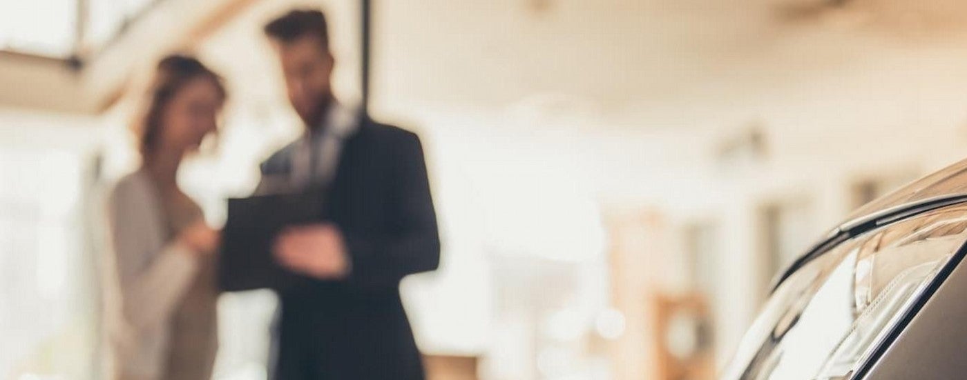 A salesperson talking to a customer.