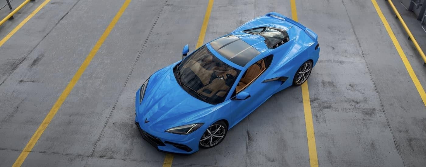 A blue 2023 Chevy Corvette is shown from above after leaving a San Antonio Chevy dealer.