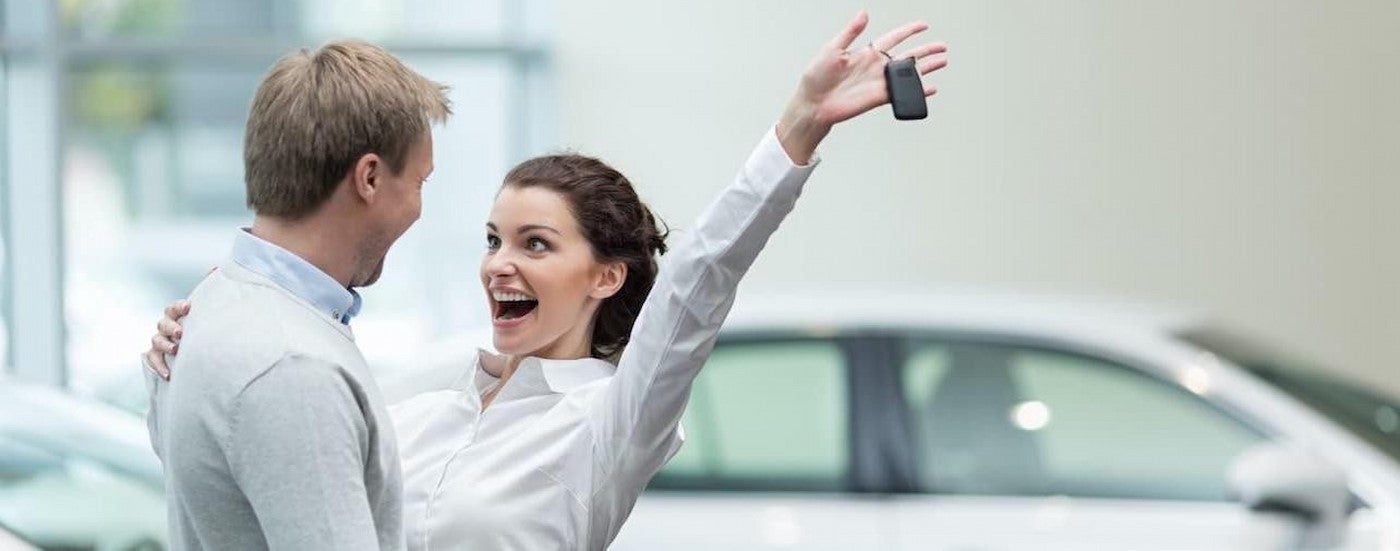 Happy people at a San Antonio Chevy Silverado dealer.