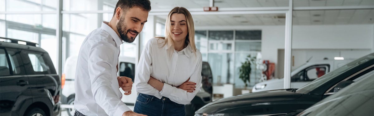Salesman helping customer at North Park Chevrolet Castroville in Castroville, TX