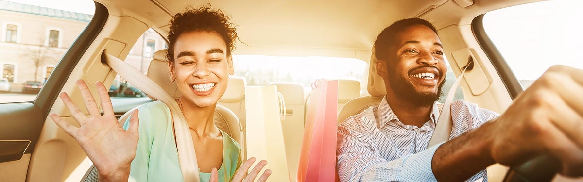 Happy customers driving to North Park Chevrolet Castroville in Castroville, TX