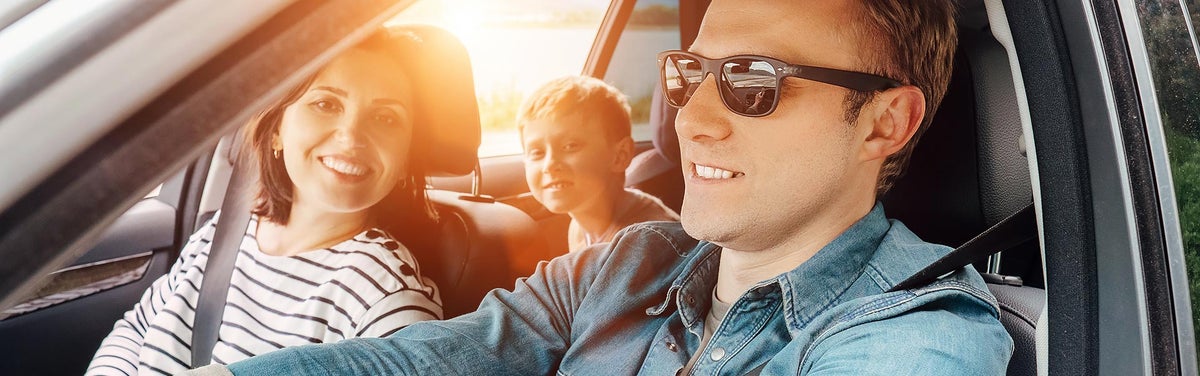 Family in car driving to North Park Chevrolet Castroville in Castroville, TX